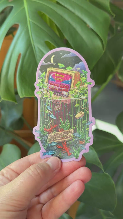 Waterlogged Retro Gamer Sticker: 2025 Spooky Lake Month